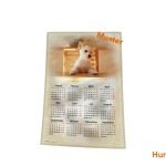 Stoff-Kalender 2025 mit verschiedenen Hunde-Motiven